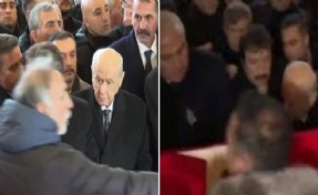 Bahçeli, makam aracına zorlukla ulaştı! Cenaze bitiminde izdiham