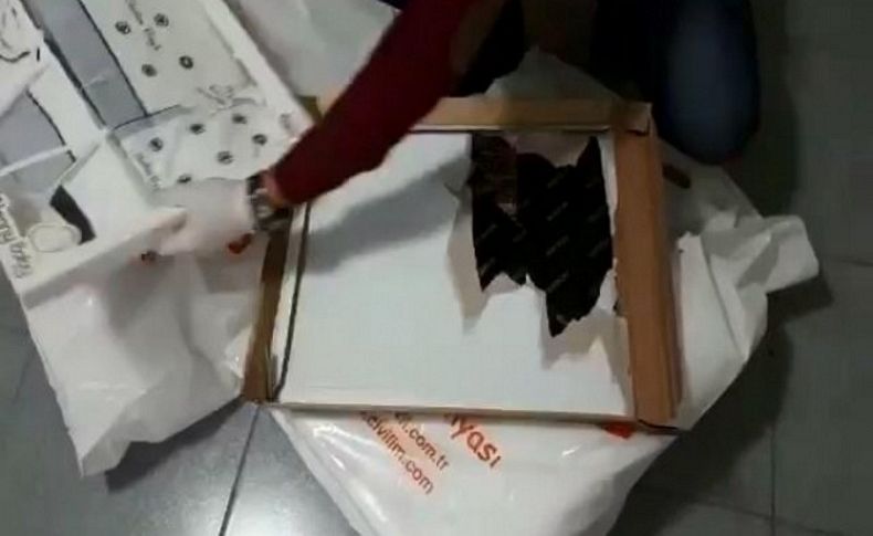 Bebek kıyafetlerinin arasından 23 bin uyuşturucu hap çıktı