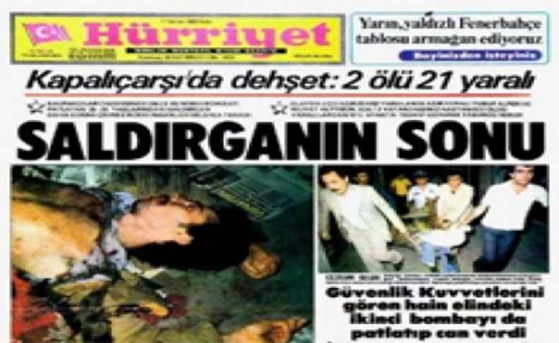 Elinde gazete şehidini arıyor